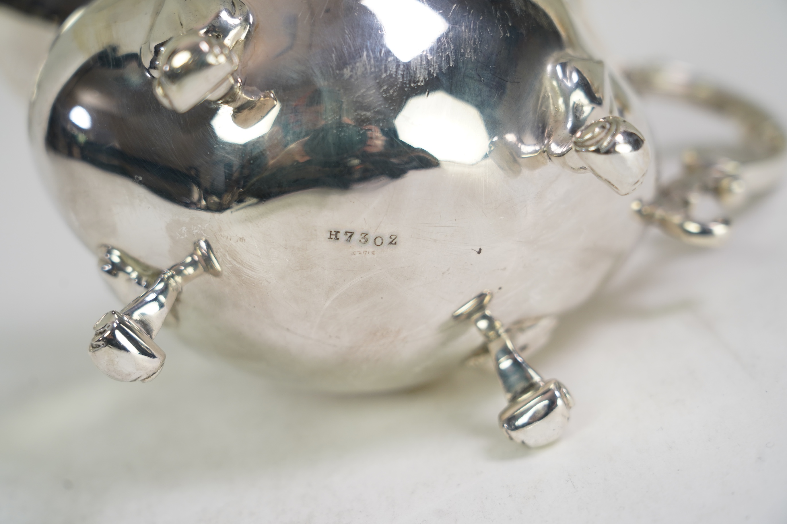 A George V silver four piece tea set by James Deakin & Sons Ltd